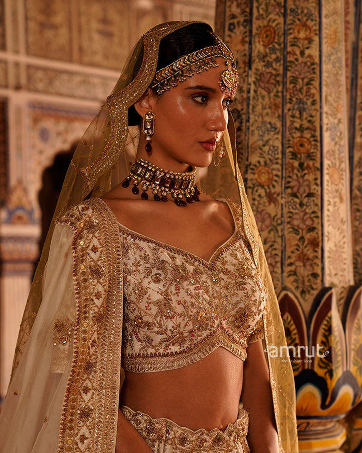 Cream and Golden Embroidered Bridal Lehenga Choli with Beige-Golden Dupatta