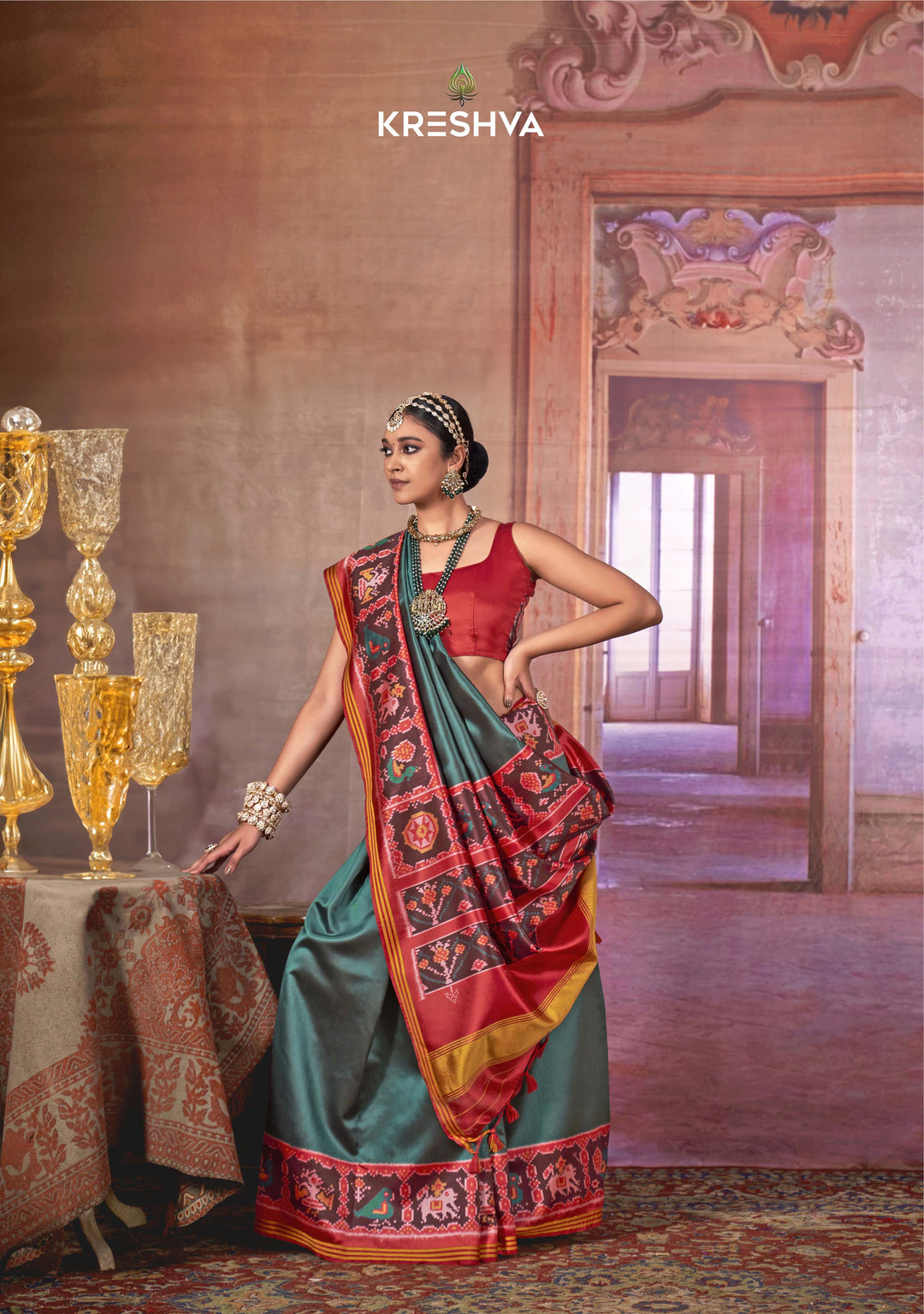 Teal Green & Red Traditional Patola Soft Silk Saree with Intricate Ikat Pallu