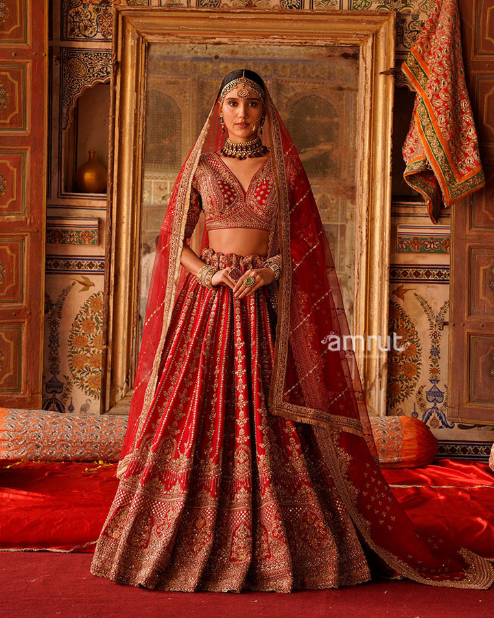 Vibrant Red Golden Embroidered Lehenga Choli with Sheer Net Dupatta