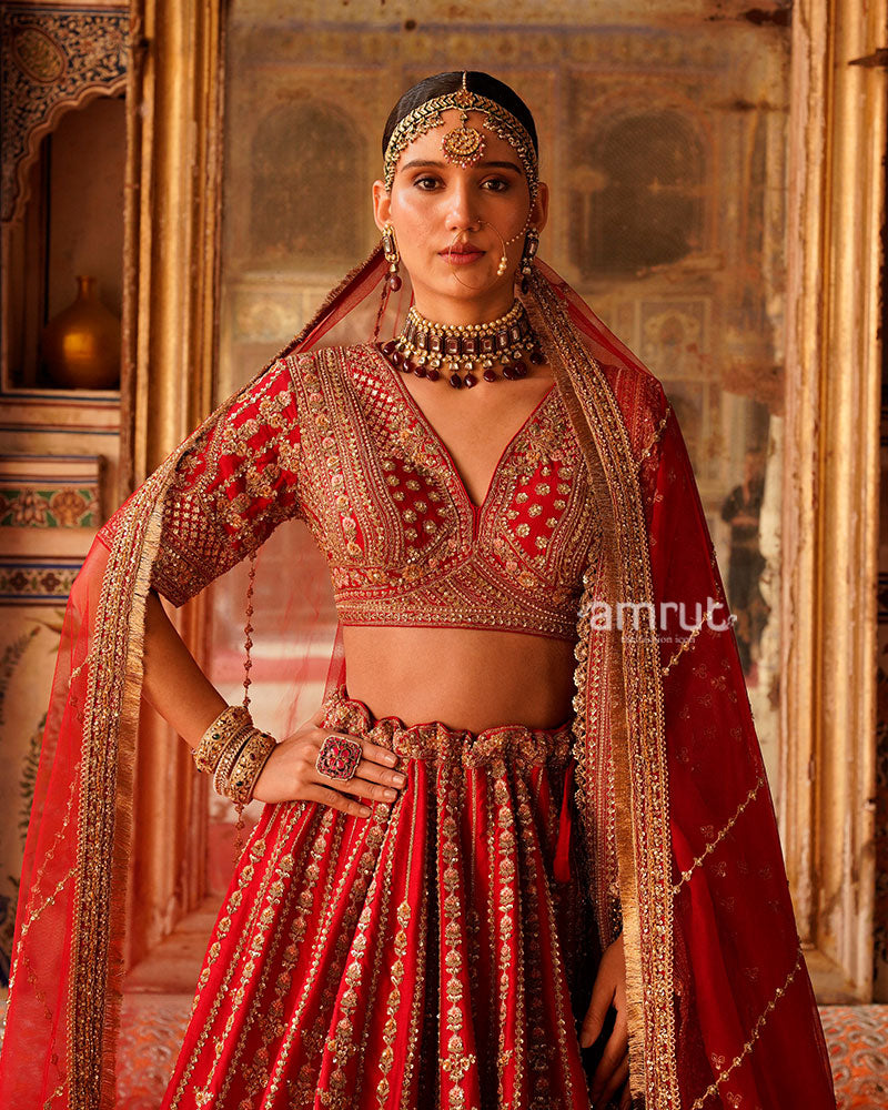 Vibrant Red Golden Embroidered Lehenga Choli with Sheer Net Dupatta