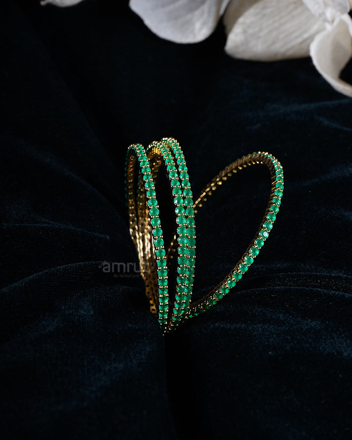 Gold-Toned Green Emerald-Colored Stones Four Bangle Set