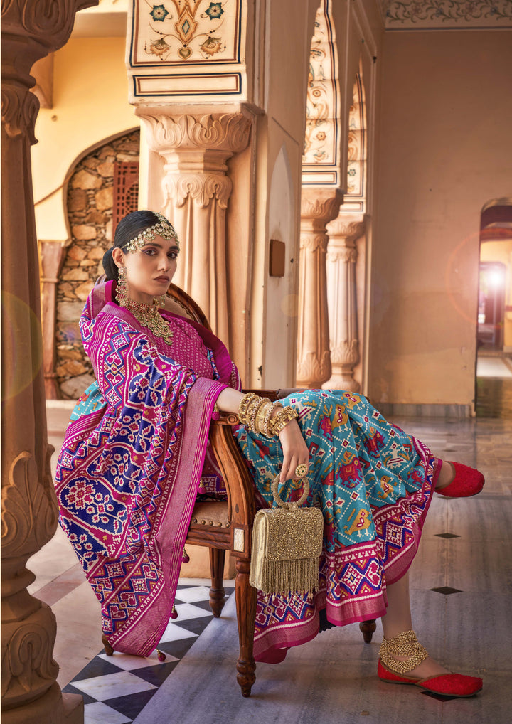 Pink & Teal Printed Patola Silk Saree with Geometric & Floral Double Ikat Weaving, Paired with Matching Unstitched Blouse
