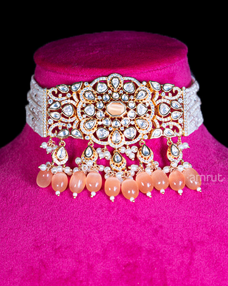 Ornate Gold-Toned Necklace with Pearls, Crystals, and Peach Teardrop Accents