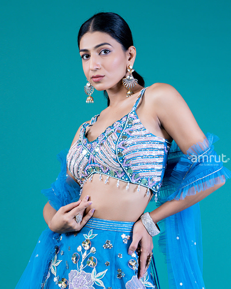 Embellished Sleeveless Sweetheart Neckline Choli with Pickton blue Lehenga and Floral Embroidery