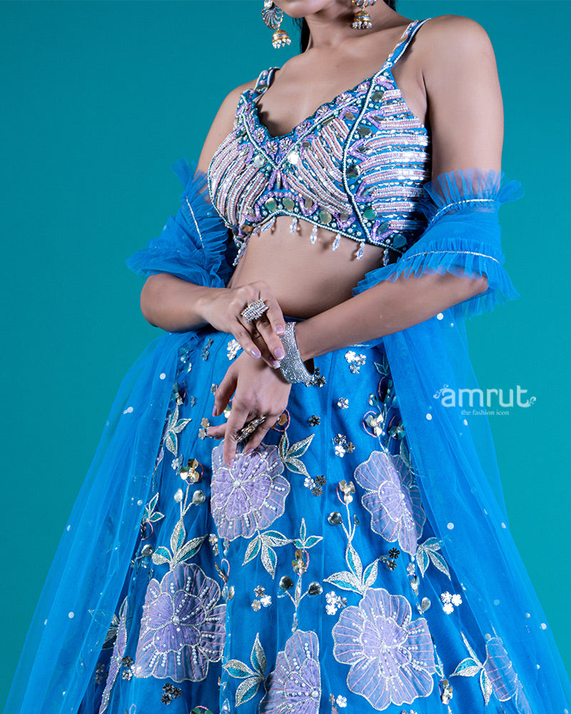 Embellished Sleeveless Sweetheart Neckline Choli with Pickton blue Lehenga and Floral Embroidery