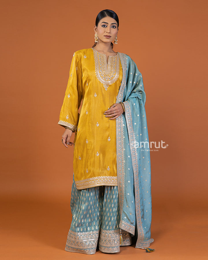 Yellow and sky-blue Zari Buti embellished salwar kameez