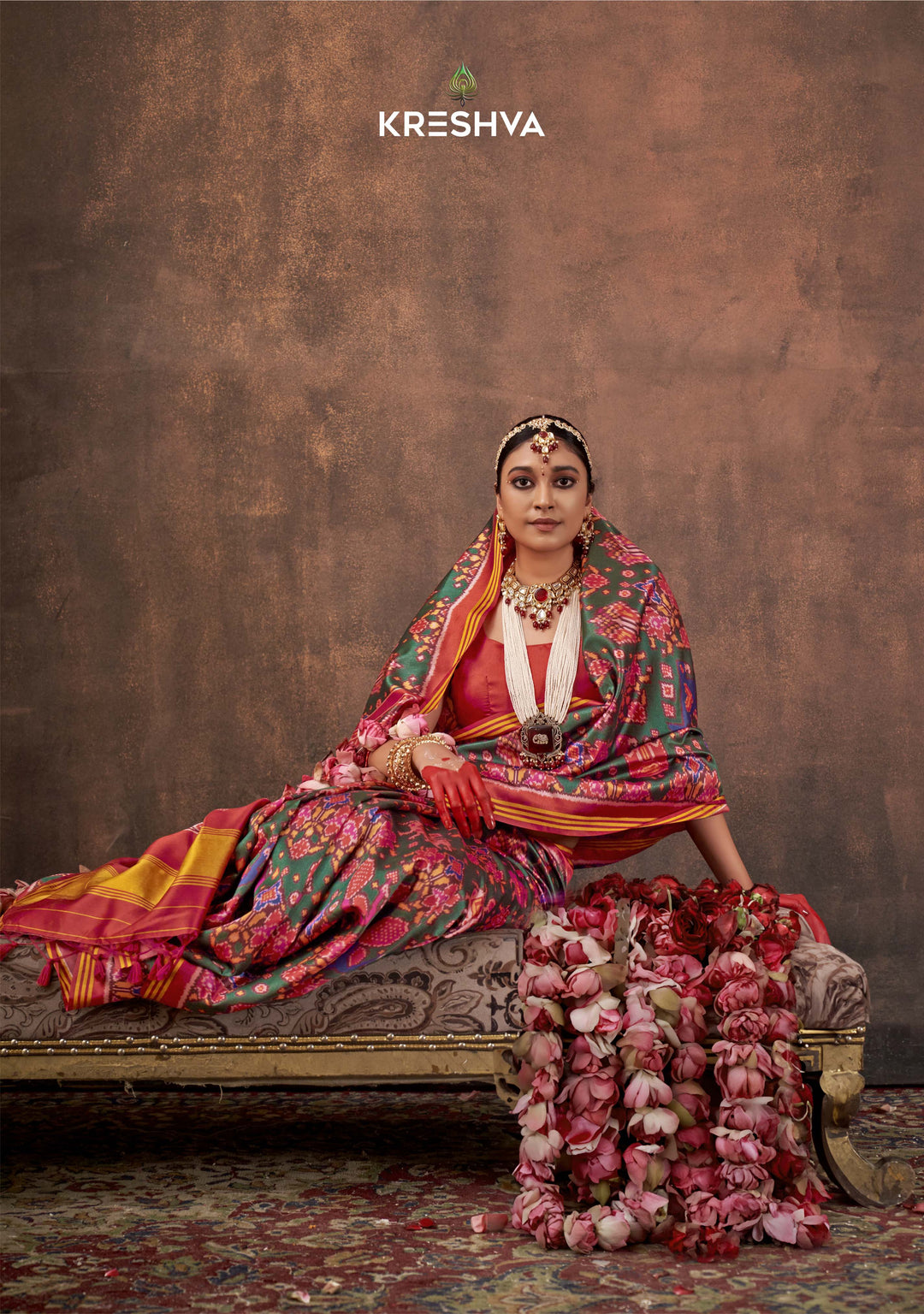 Green Patan Patola Silk Saree with Multicolour Ikat Motifs P84