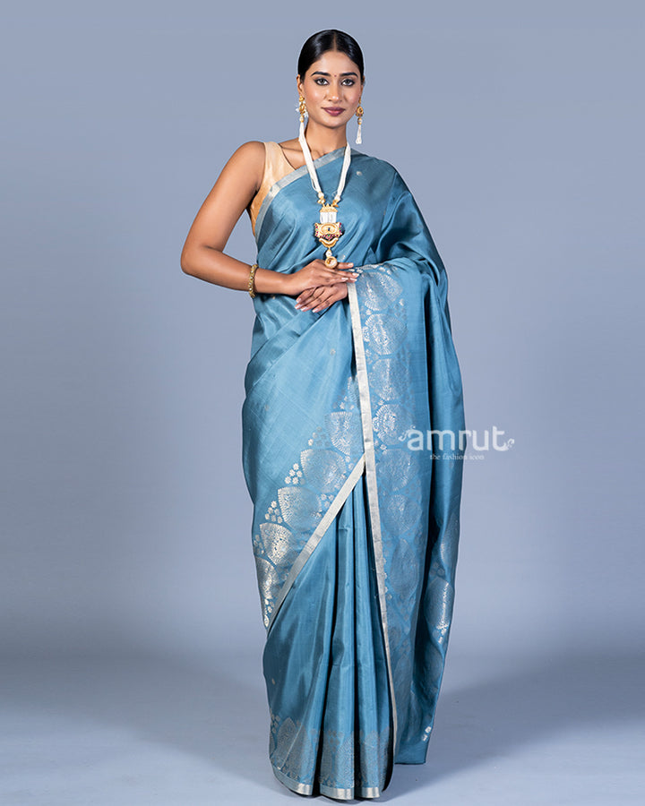 Light Teal Blue with Metallic Silver Floral Motif and Beige Borders Silk Saree with Unstitched Blouse