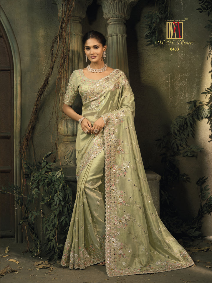 Pastel Green Silk Saree with Intricate Embroidery & Elegant Zari Border