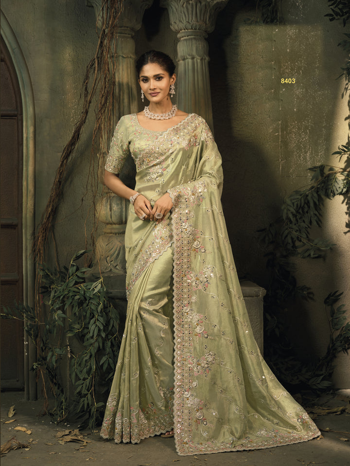 Pastel Green Silk Saree with Intricate Embroidery & Elegant Zari Border
