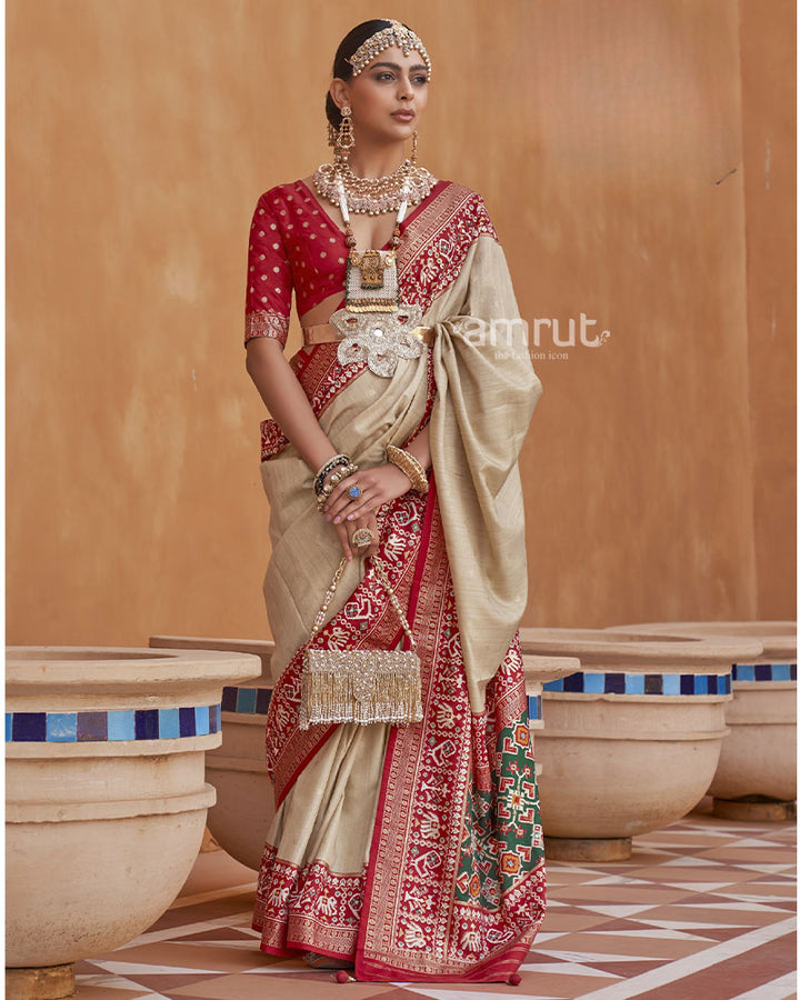 Beige Pure Patola Silk Saree With Printed Borderand Unstitched Blouse Piece