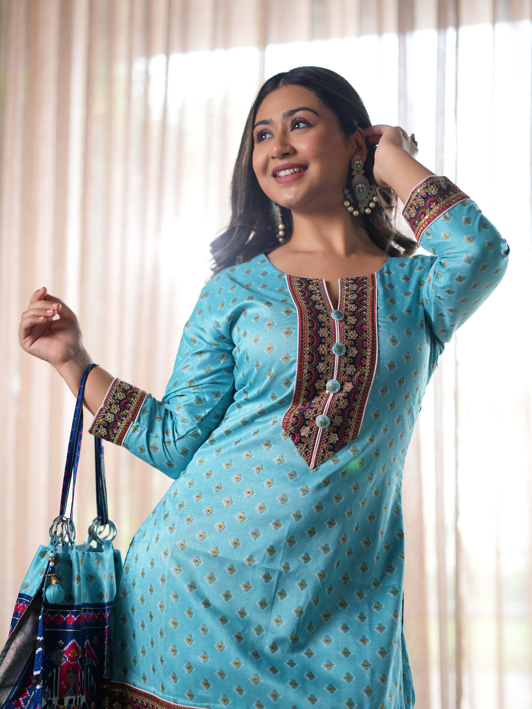 Elegant Blue Printed Cotton Suit Set with Coordinated Handbag