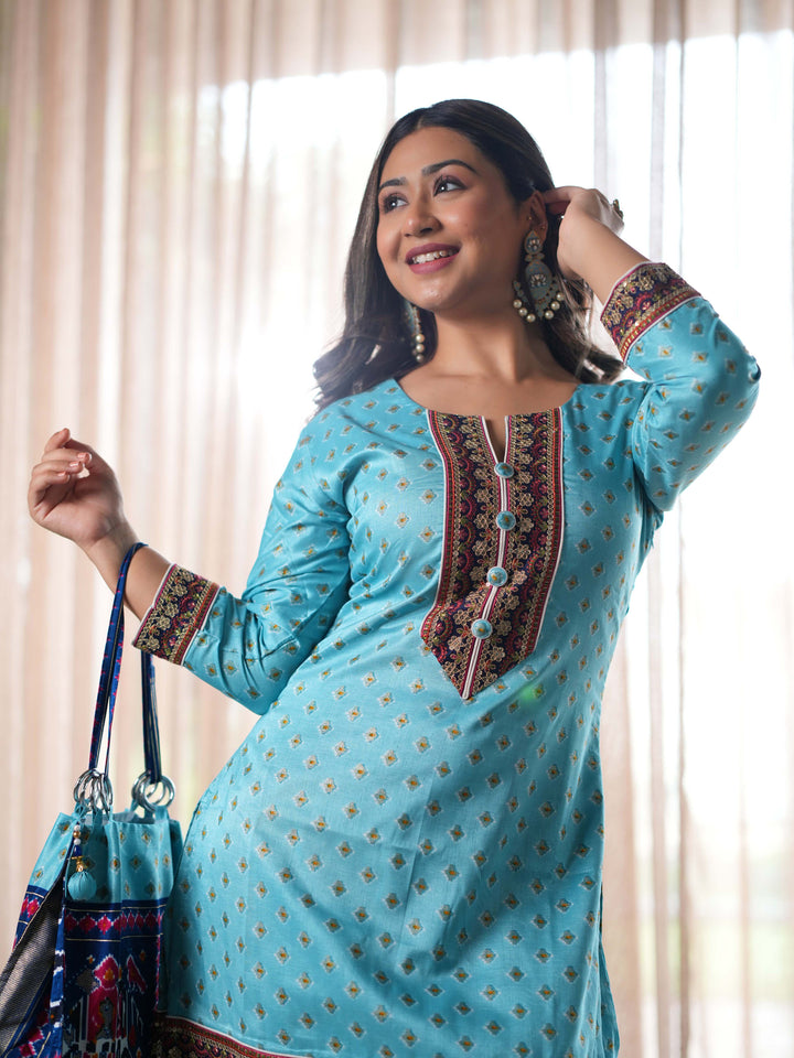 Elegant Blue Printed Cotton Suit Set with Coordinated Handbag