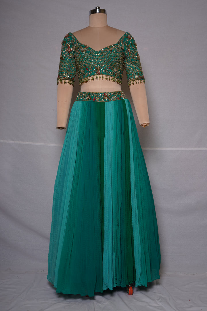 Teal Green Embroidered Crop Top with Pleated Lehenga Skirt