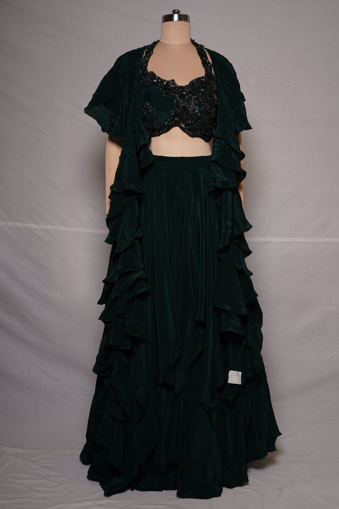 Emerald Green Ruffle Designer Lehenga Set with Embellished Blouse & Cape Jacket