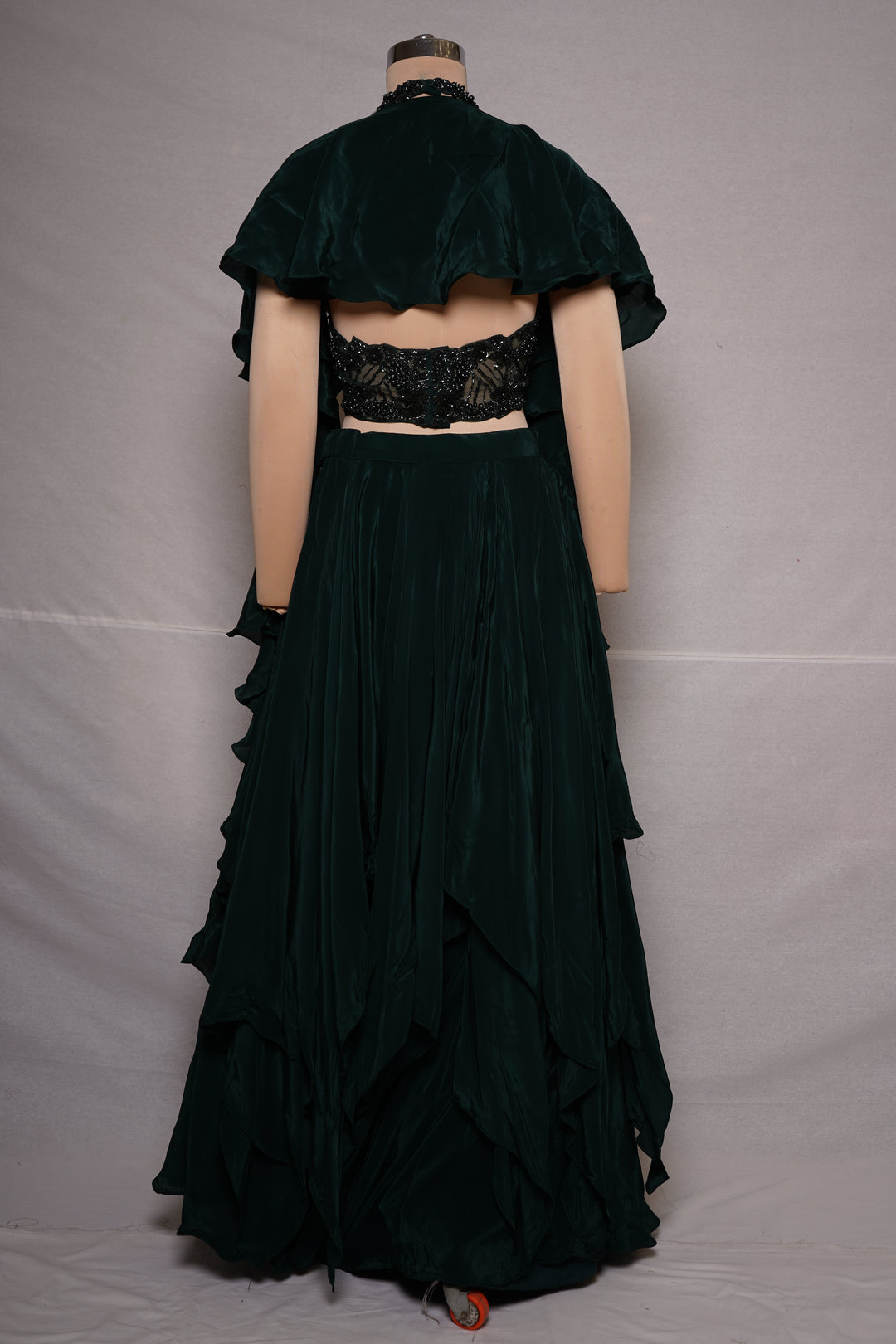 Emerald Green Ruffle Designer Lehenga Set with Embellished Blouse & Cape Jacket