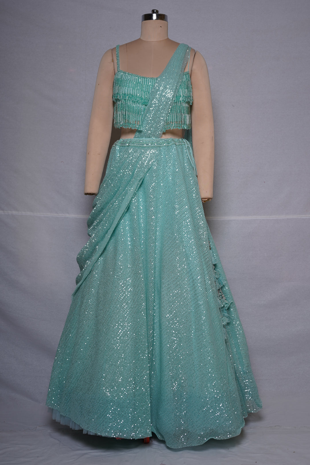 Ice Blue Sequin Draped Lehenga with Fringe Blouse