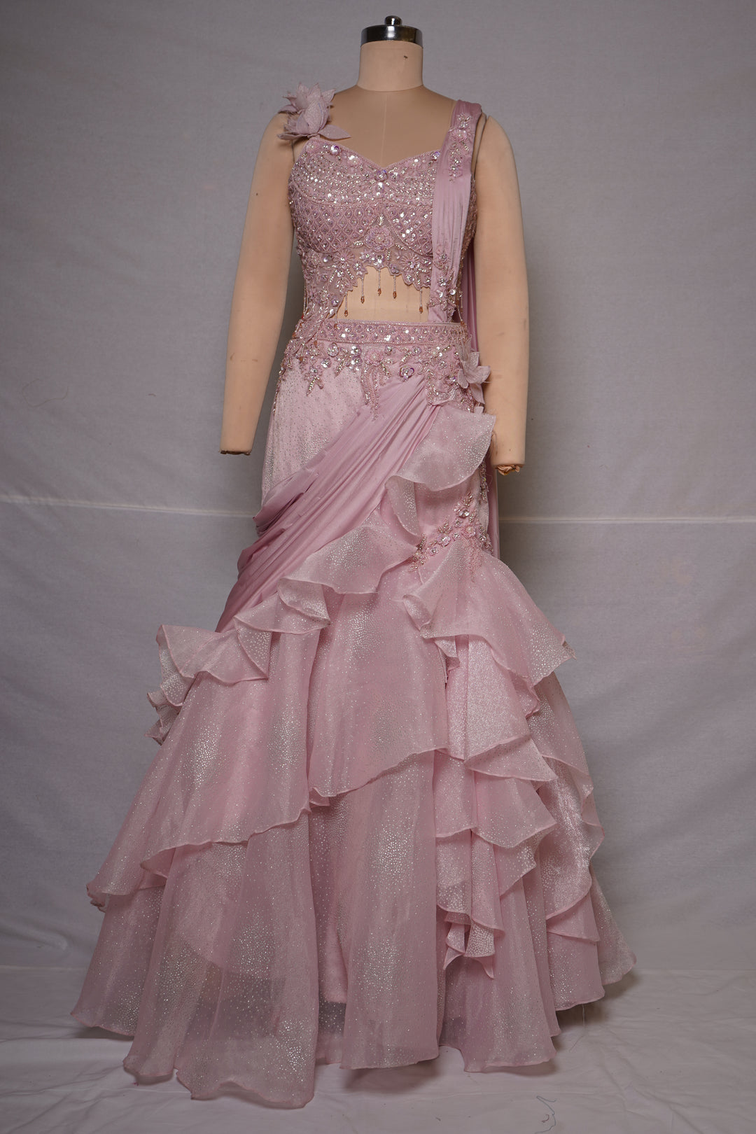 Blush Pink Embellished Ruffle Lehenga Saree with Floral Shoulder Accent