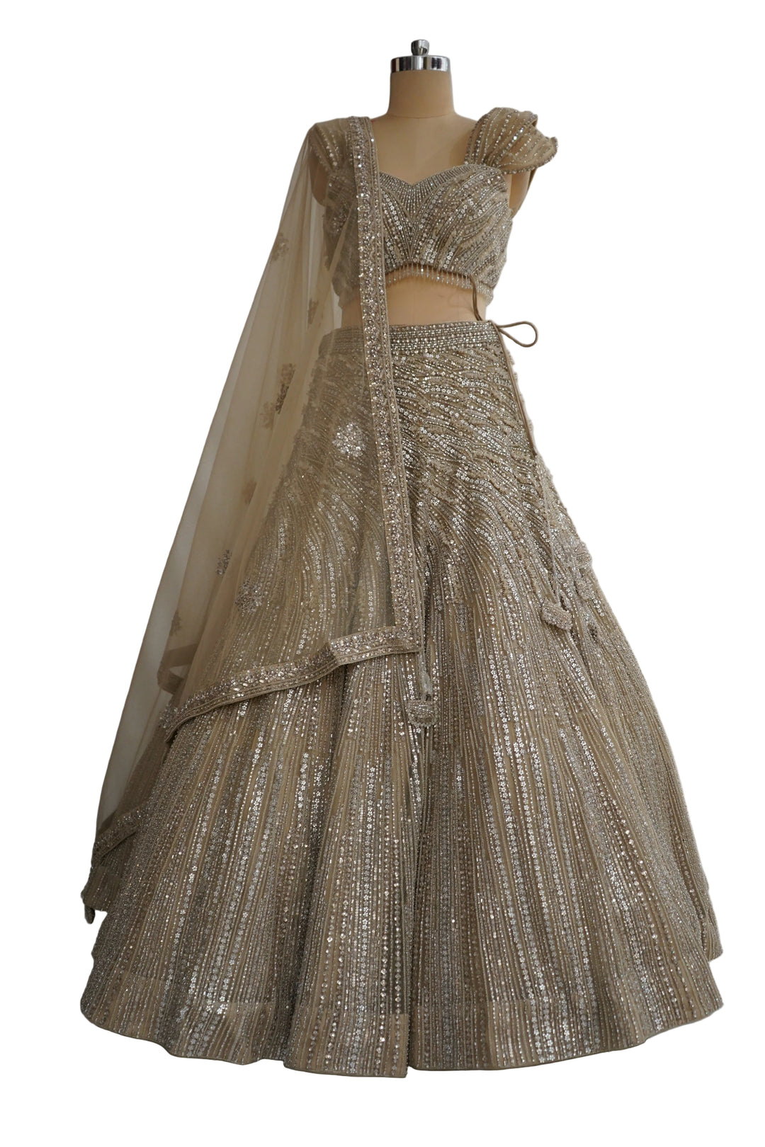 Champagne Gold Designer Lehenga Set with Embellished Blouse and Net Dupatta