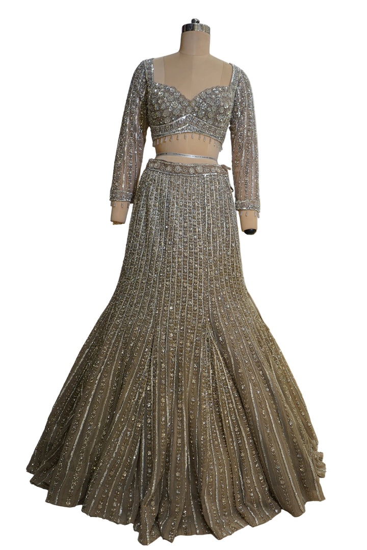 Antique Gold Mermaid Lehenga Set with Crystal Embellished Blouse and Net Dupatta