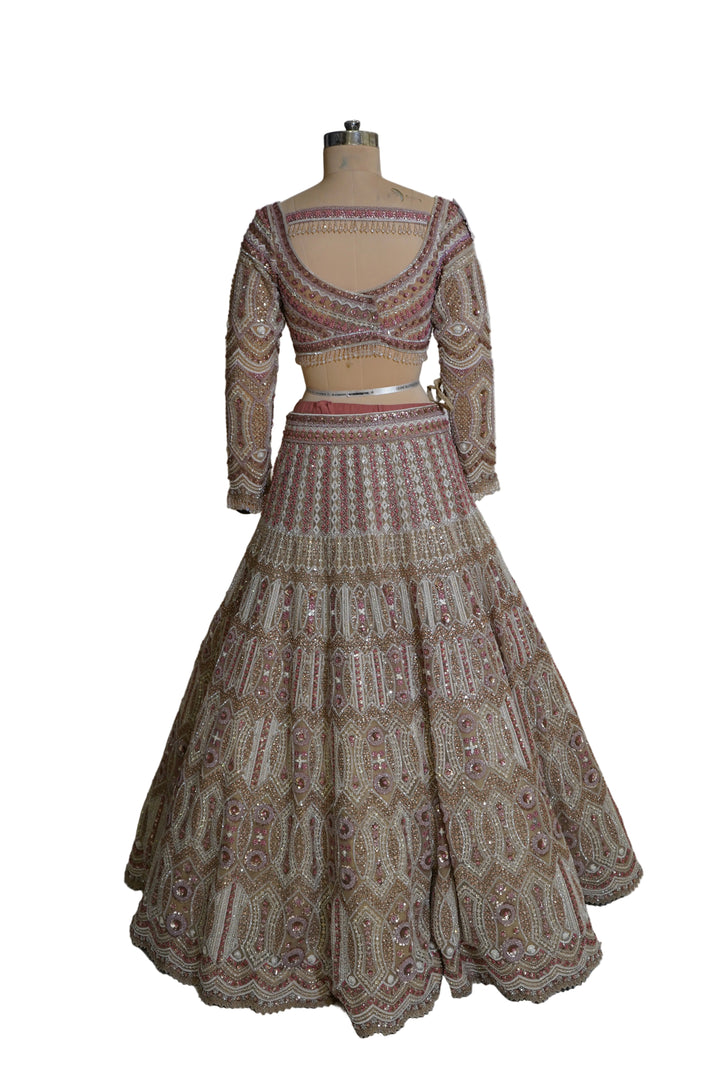 Champagne Beige Designer Lehenga Set with Intricate Embroidered Blouse and Net Dupatta