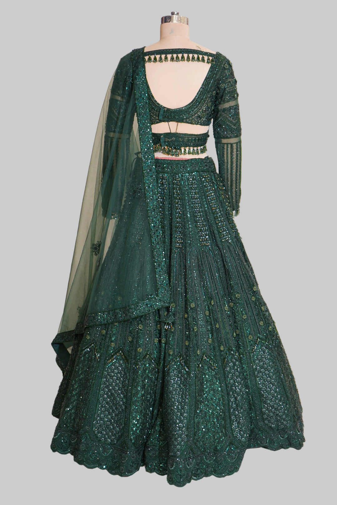 Emerald Green Designer Lehenga Set with Sequins Embellished Blouse and Net Dupatta