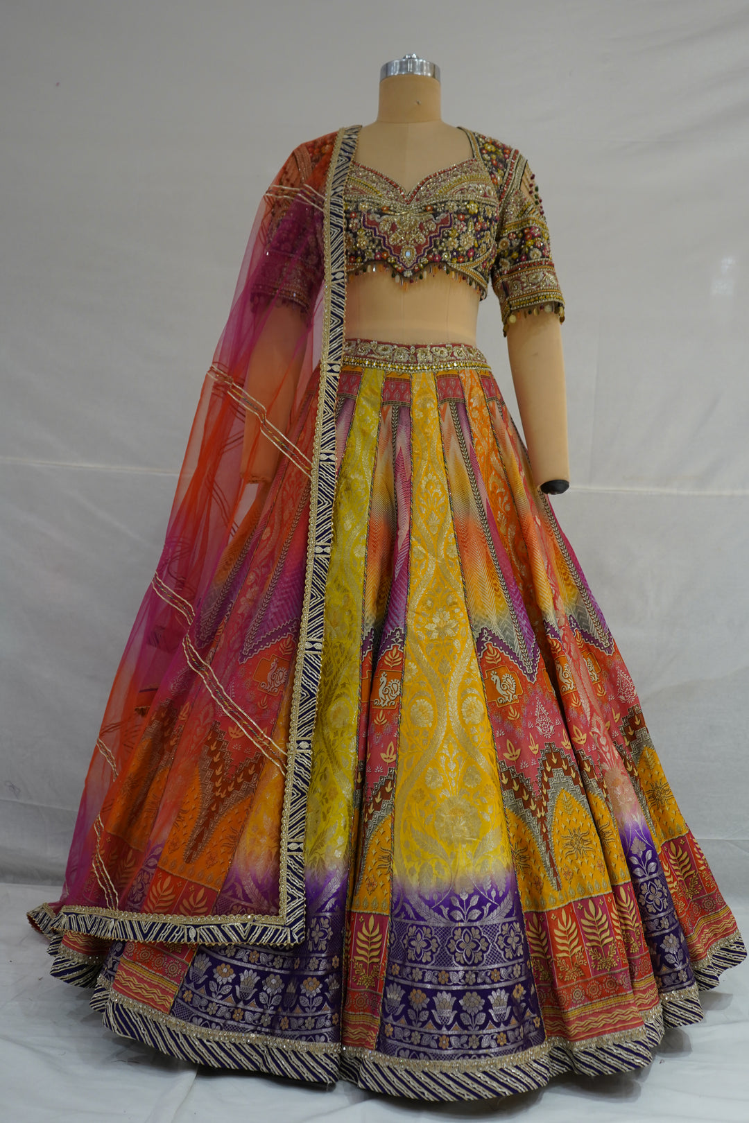 Multicolour Woven Designer Lehenga Choli with Heavy Embroidered Blouse & Pink Net Dupatta