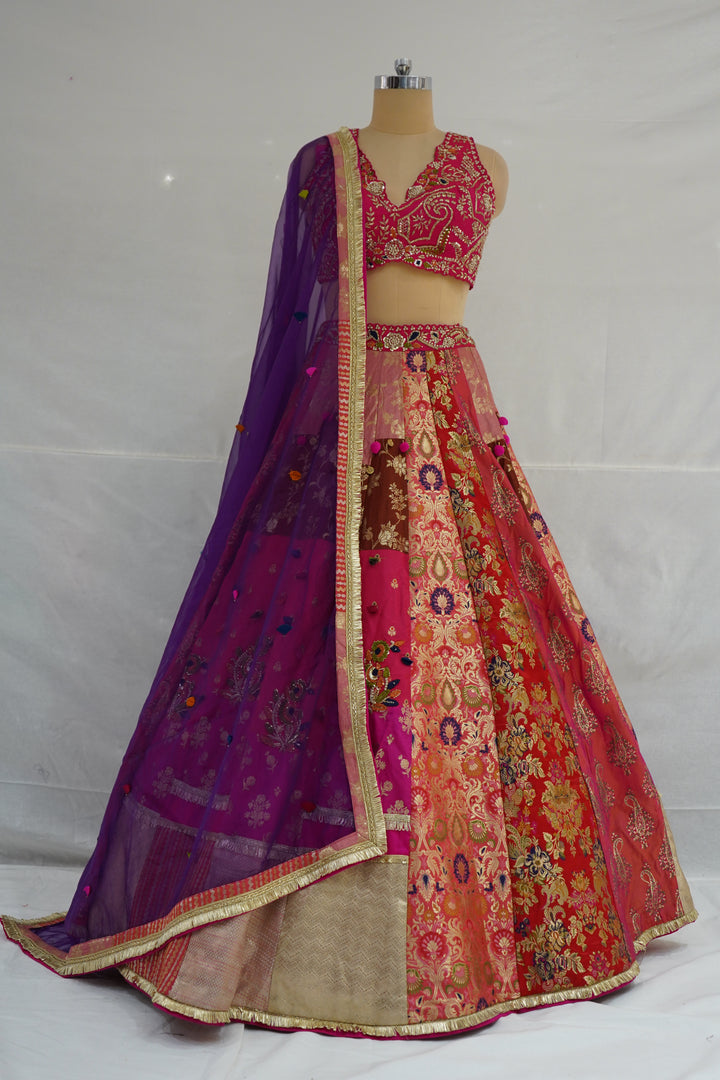 Rani Pink & Multicolour Banarasi Woven Designer Lehenga Choli with Purple Net Dupatta