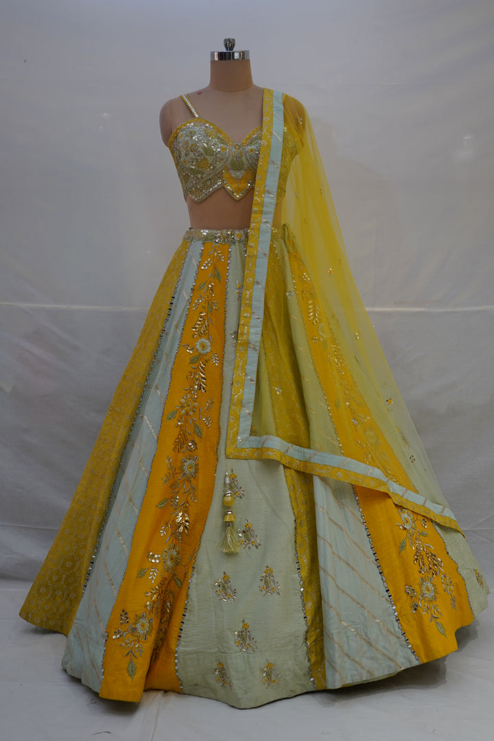 Mustard Yellow & Mint Green Designer Lehenga Choli with Embroidered Panels and Net Dupatta