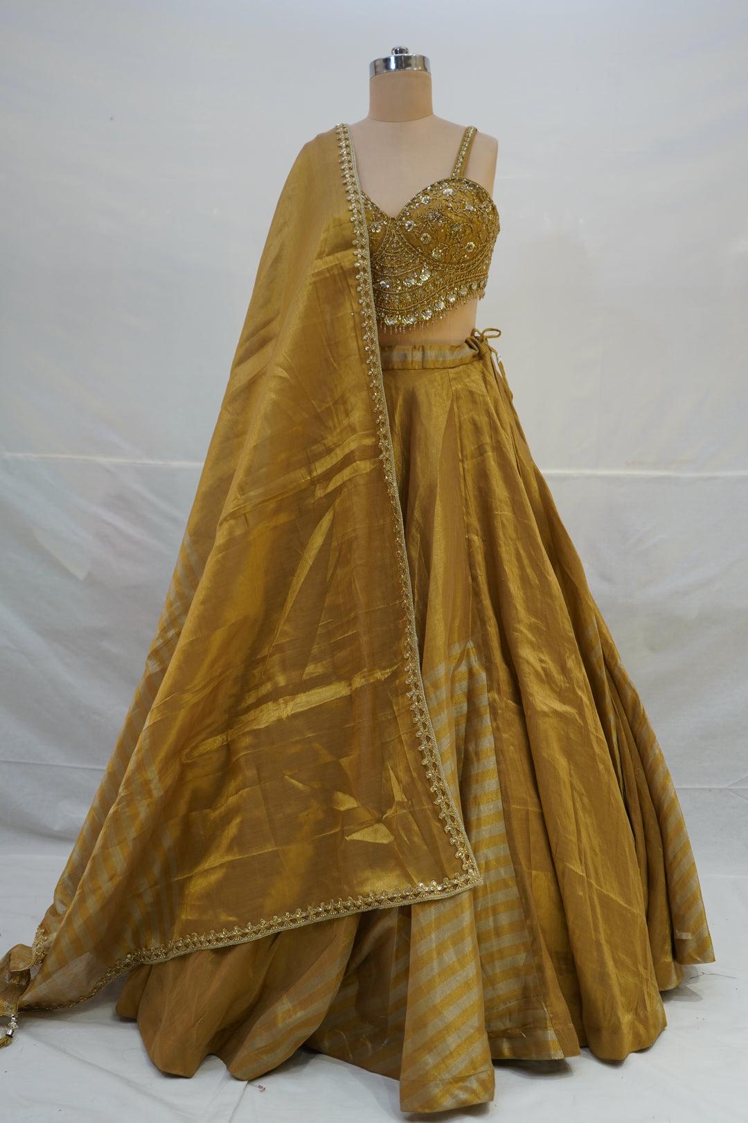 Golden Silk Lehenga Choli with Embellished Bustier & Sheer Dupatta