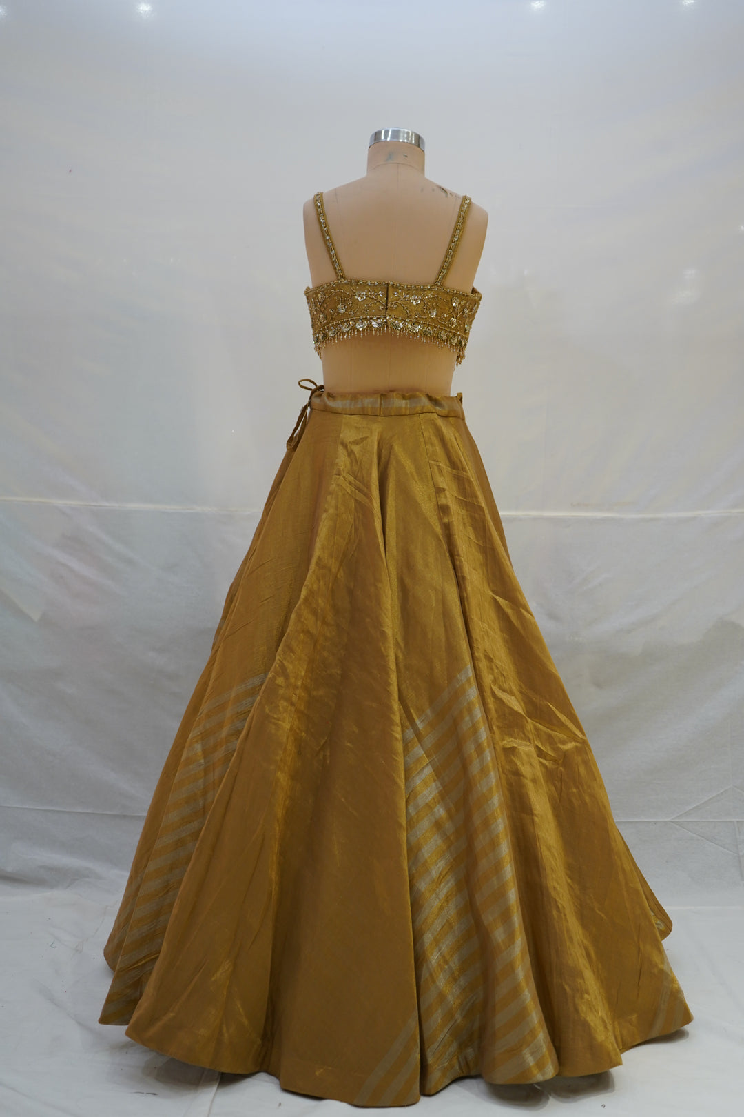 Golden Silk Lehenga Choli with Embellished Bustier & Sheer Dupatta