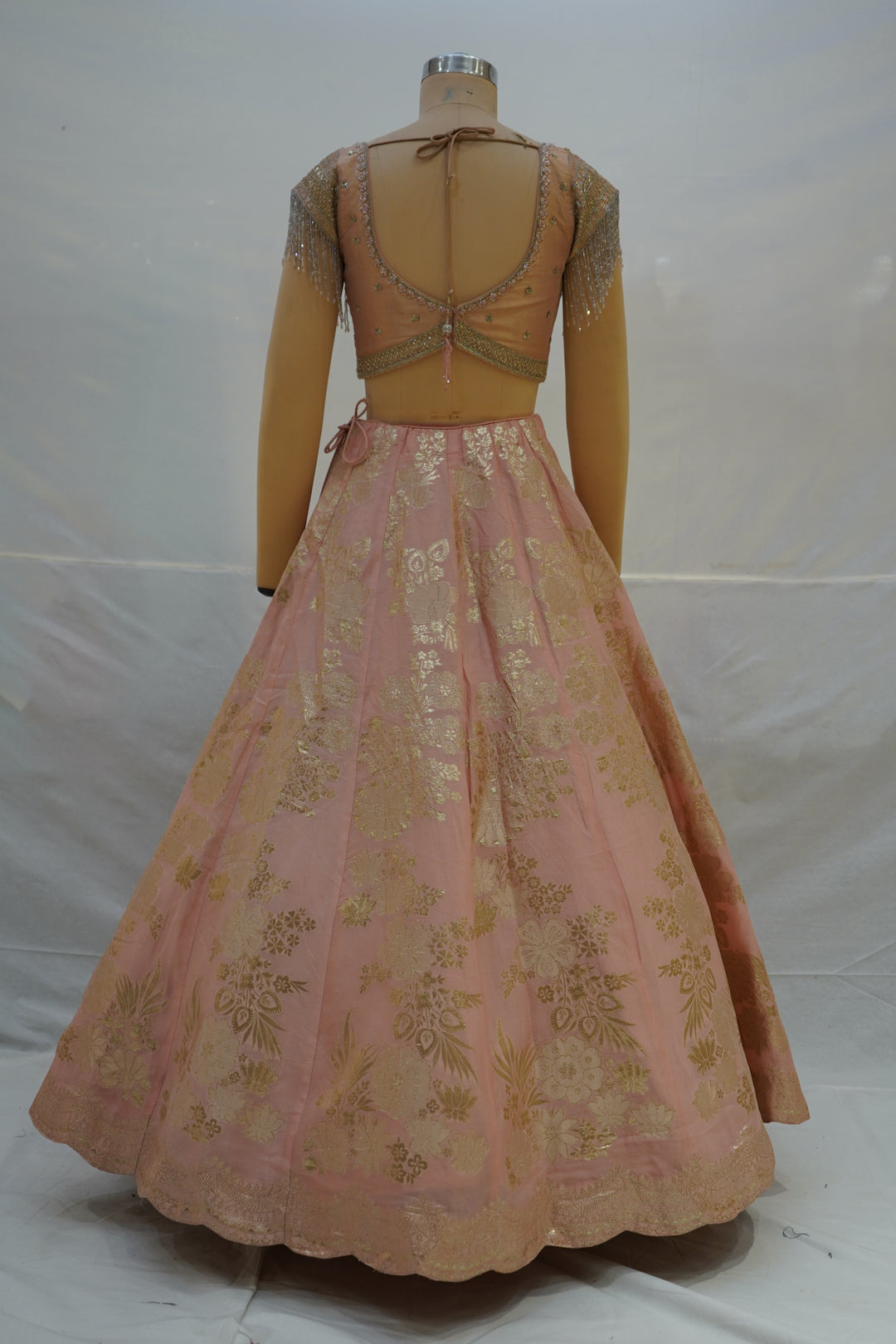 Blush Pink Silk Lehenga Choli with Gold Floral Weaving & Sheer Dupatta