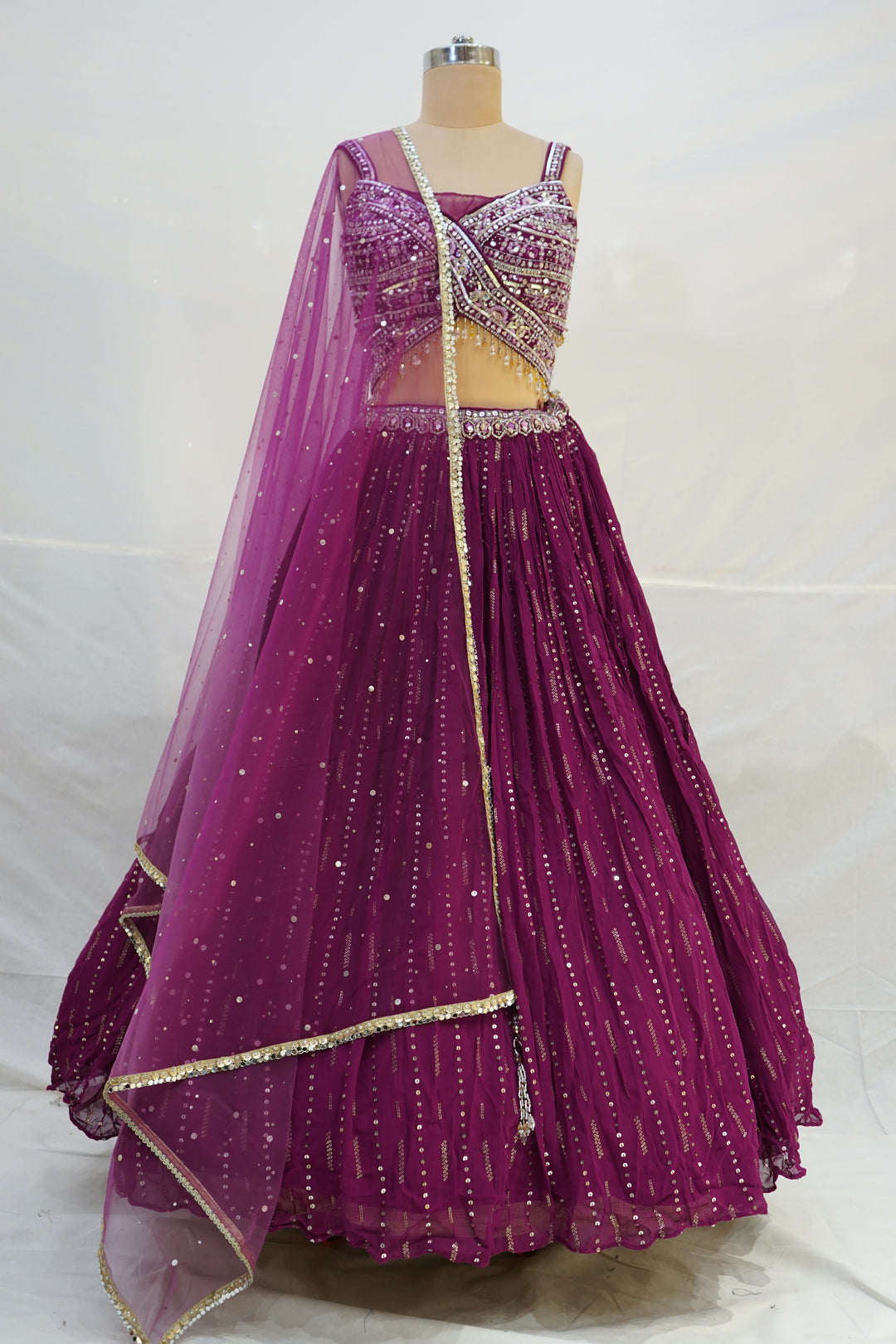 Deep Wine Pleated Lehenga Choli with Embellished Cross Blouse & Sheer Dupatta