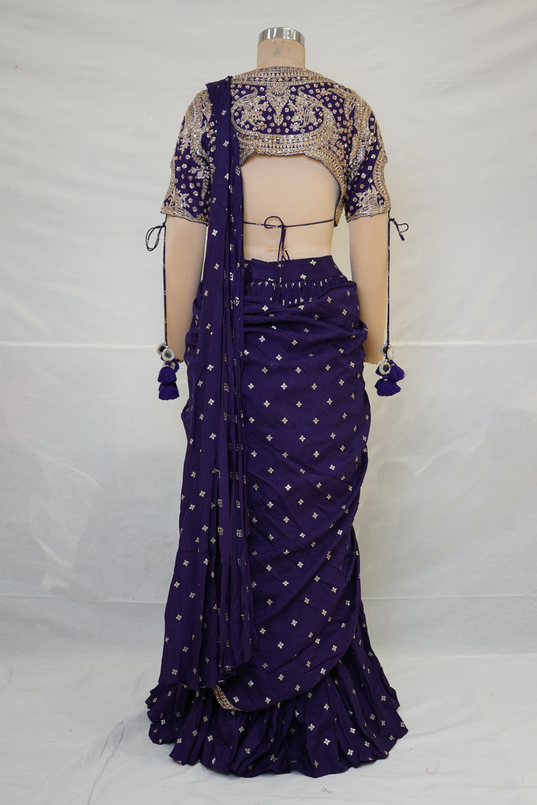 Royal Purple Designer Saree with Embroidered Blouse & Tassel Detailing