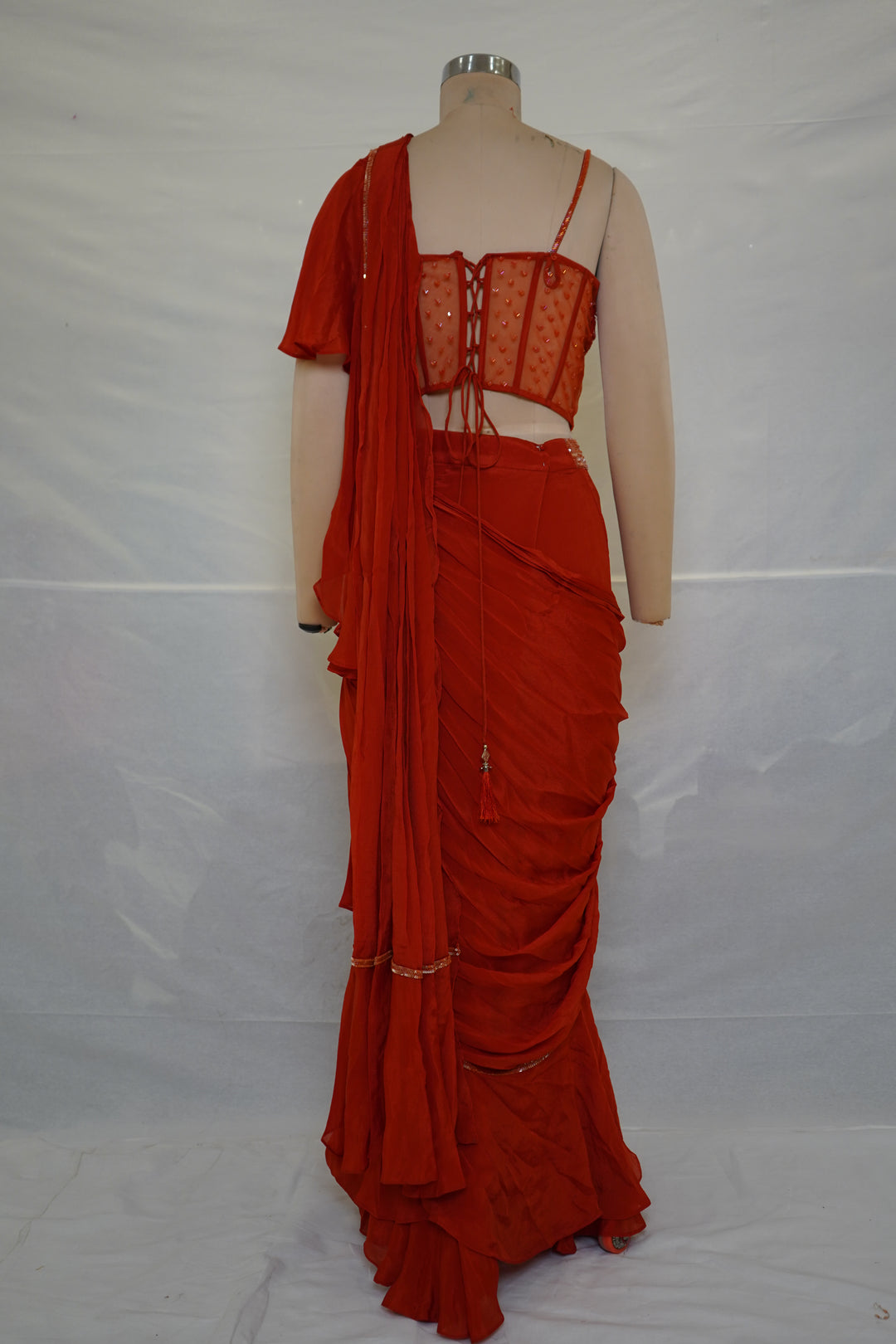 Red Ready-to-Wear Ruffle Saree with Embroidered Corset Blouse & Sheer Pallu