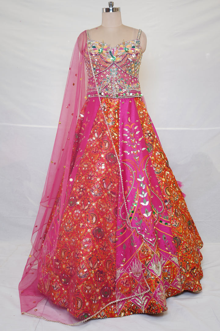 Rani Pink & Orange Embroidered Lehenga Set with Multicolor Blouse & Net Dupatta