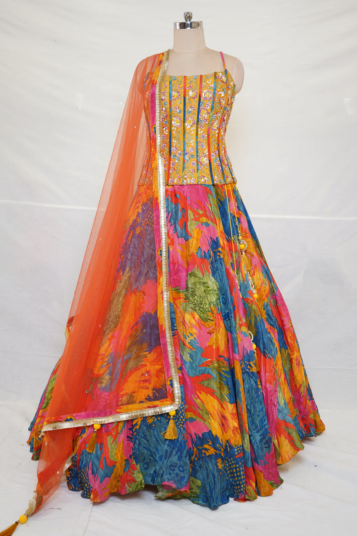 Abstract Multicolor Printed Lehenga Set with Embroidered Bustier & Orange Dupatta