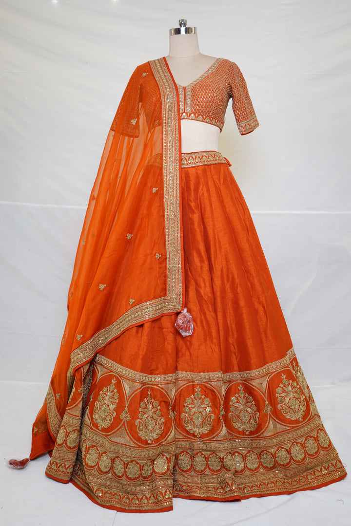 Vibrant Orange Silk Lehenga Choli with Zari Border & Dupatta