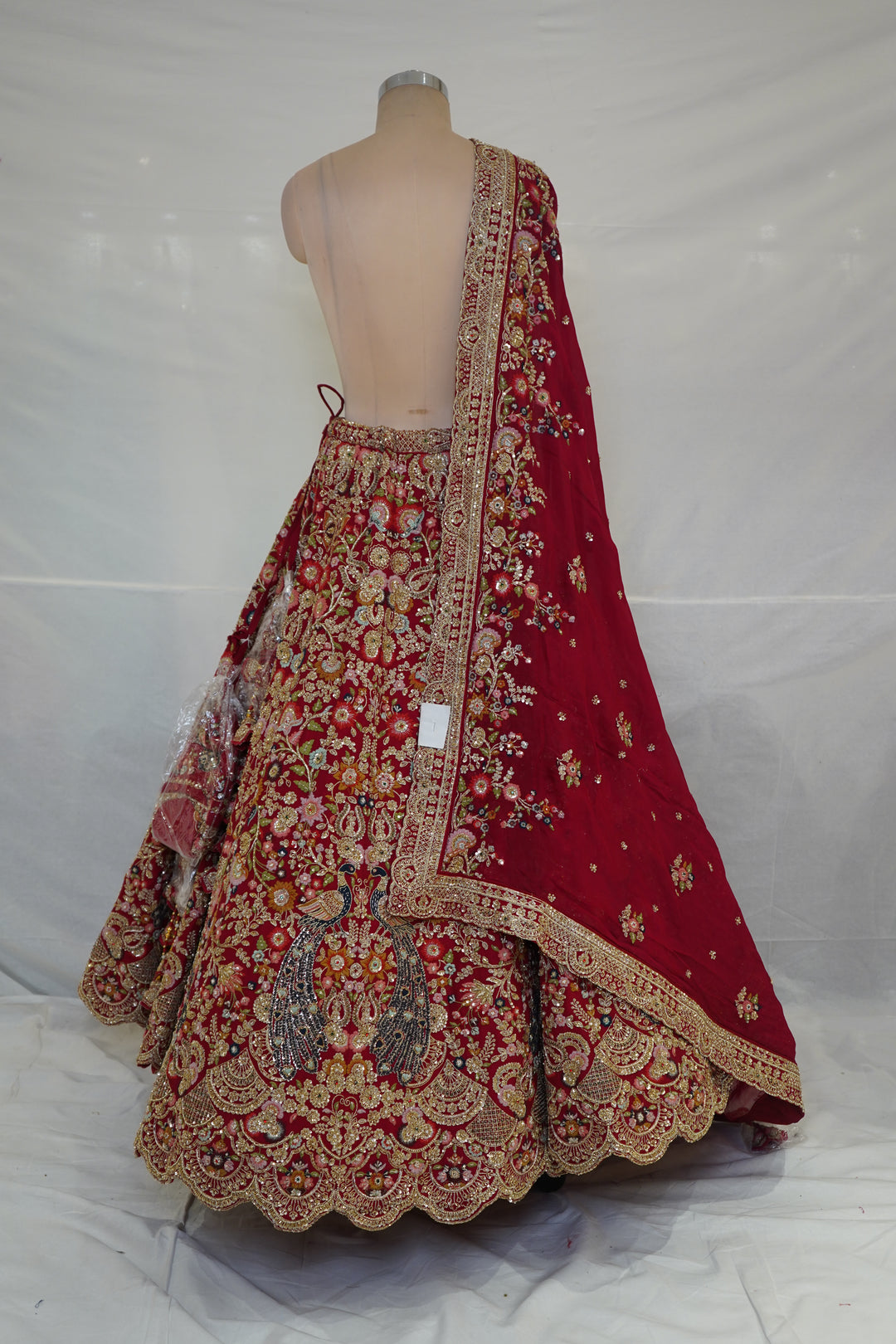 Royal Crimson Bridal Lehenga Set with Intricate Zardozi Embroidery & Peacock Motifs