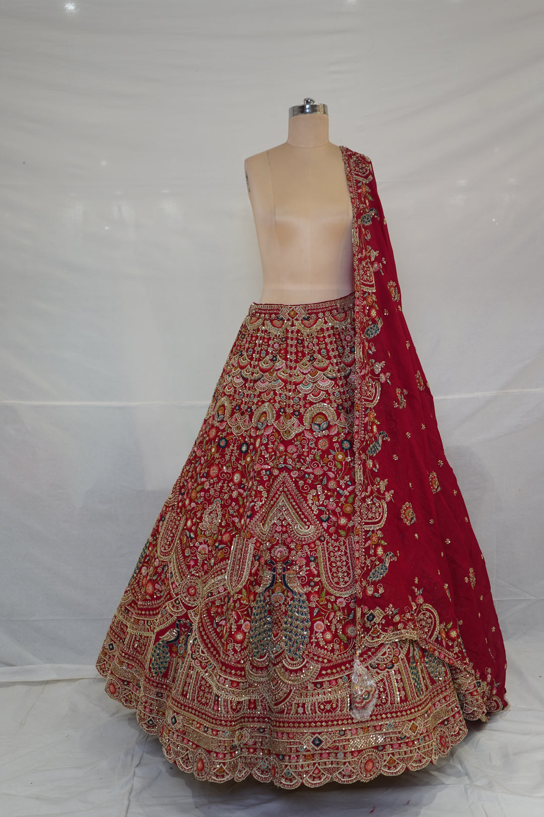 Royal Ruby Red Bridal Lehenga Set with Peacock Motifs & Heritage Zardozi Embroidery