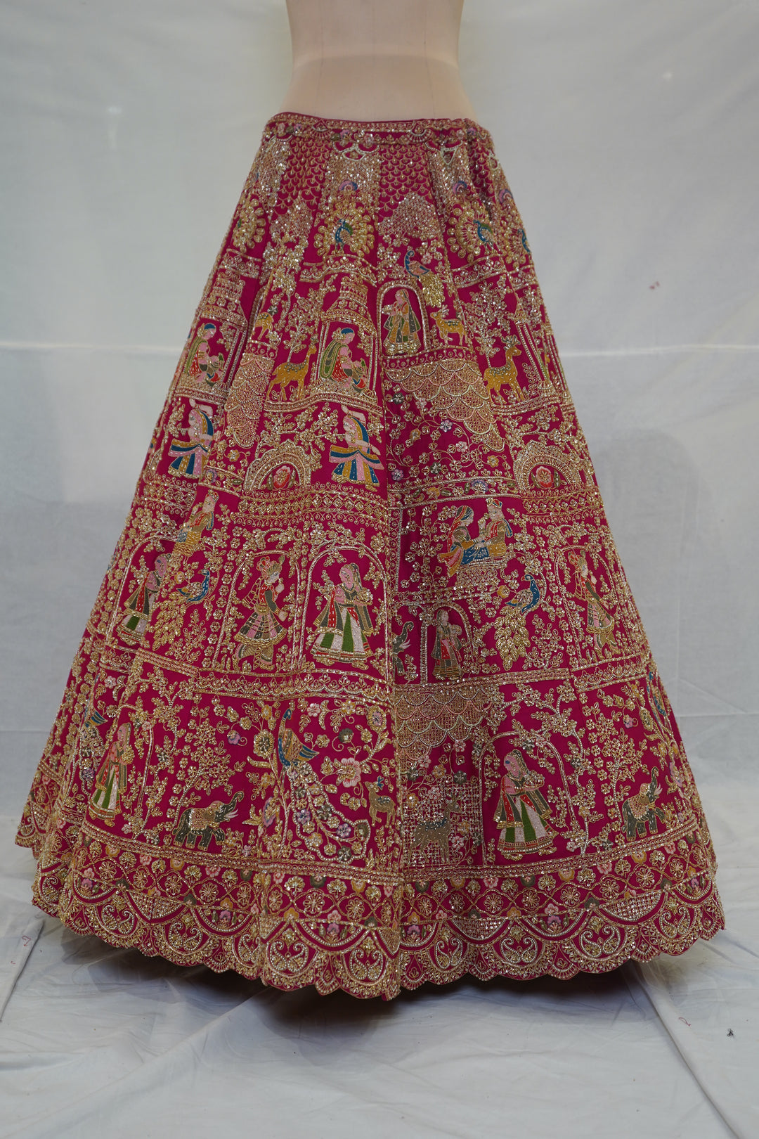 Rani Pink Royal Bridal Lehenga Set with Heritage Motif Embroidery & Designer Net Dupatta