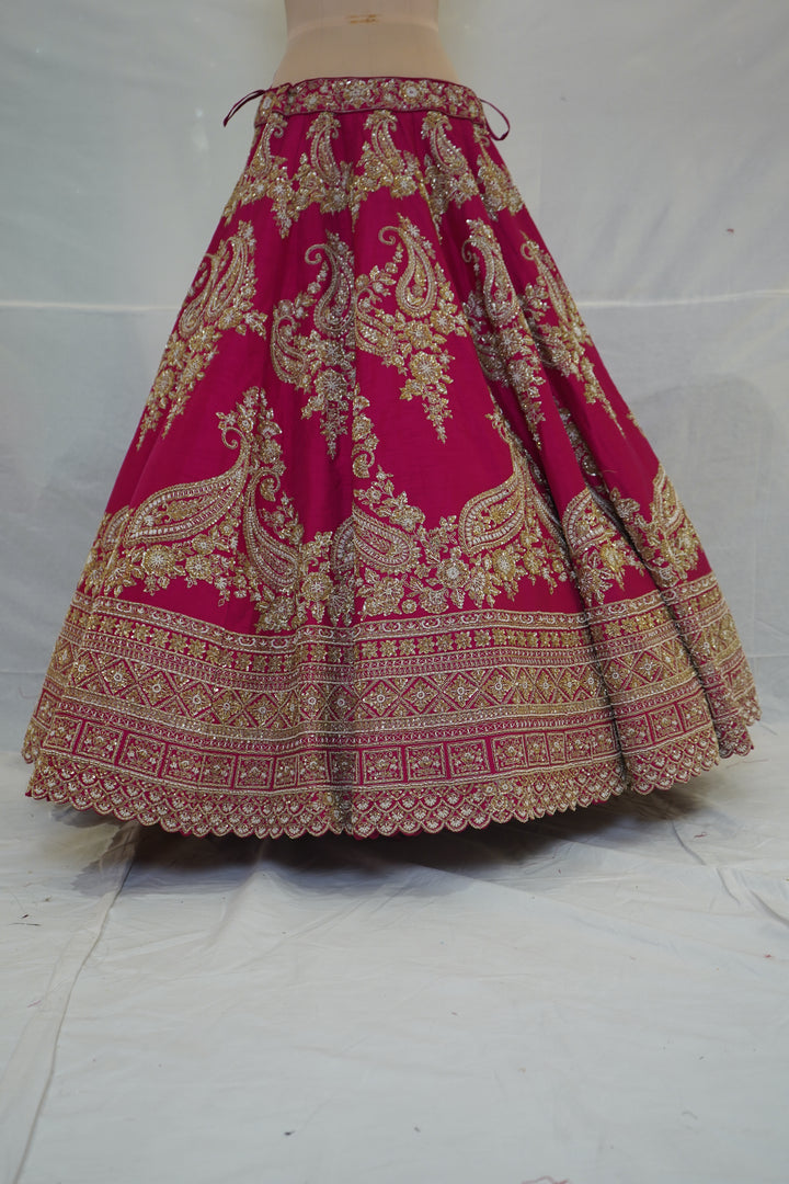 Rani Pink Designer Bridal Lehenga Set with Paisley Zari Embroidery & Embellished Net Dupatta