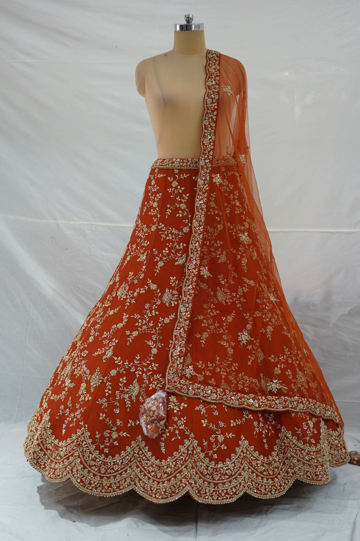 Rust Orange Designer Bridal Lehenga Set with Heavy Zari Embroidery & Net Dupatta