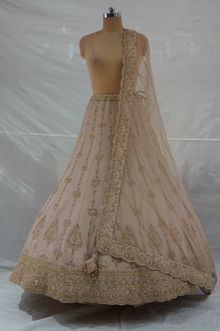 Champagne Beige Designer Bridal Lehenga Set with Heavy Zari Embroidery & Net Dupatta