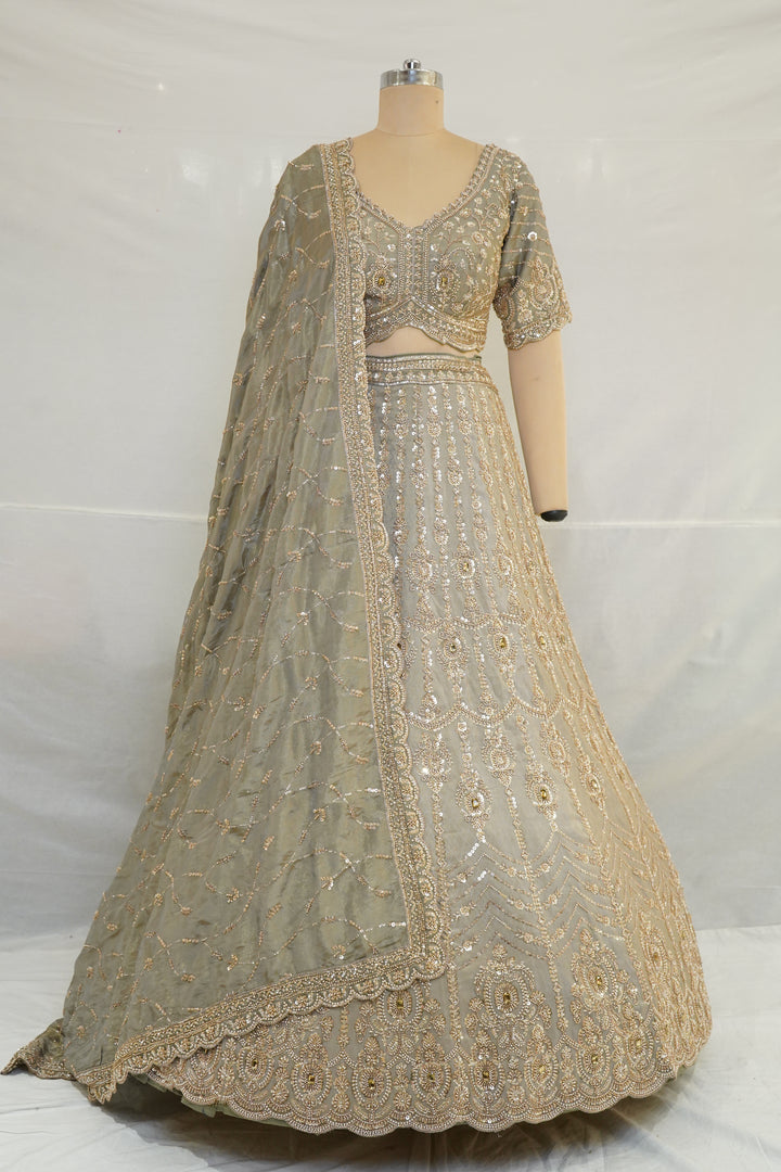 Champagne Beige Designer Lehenga Set with Sequin Embroidery & Embellished Net Dupatta