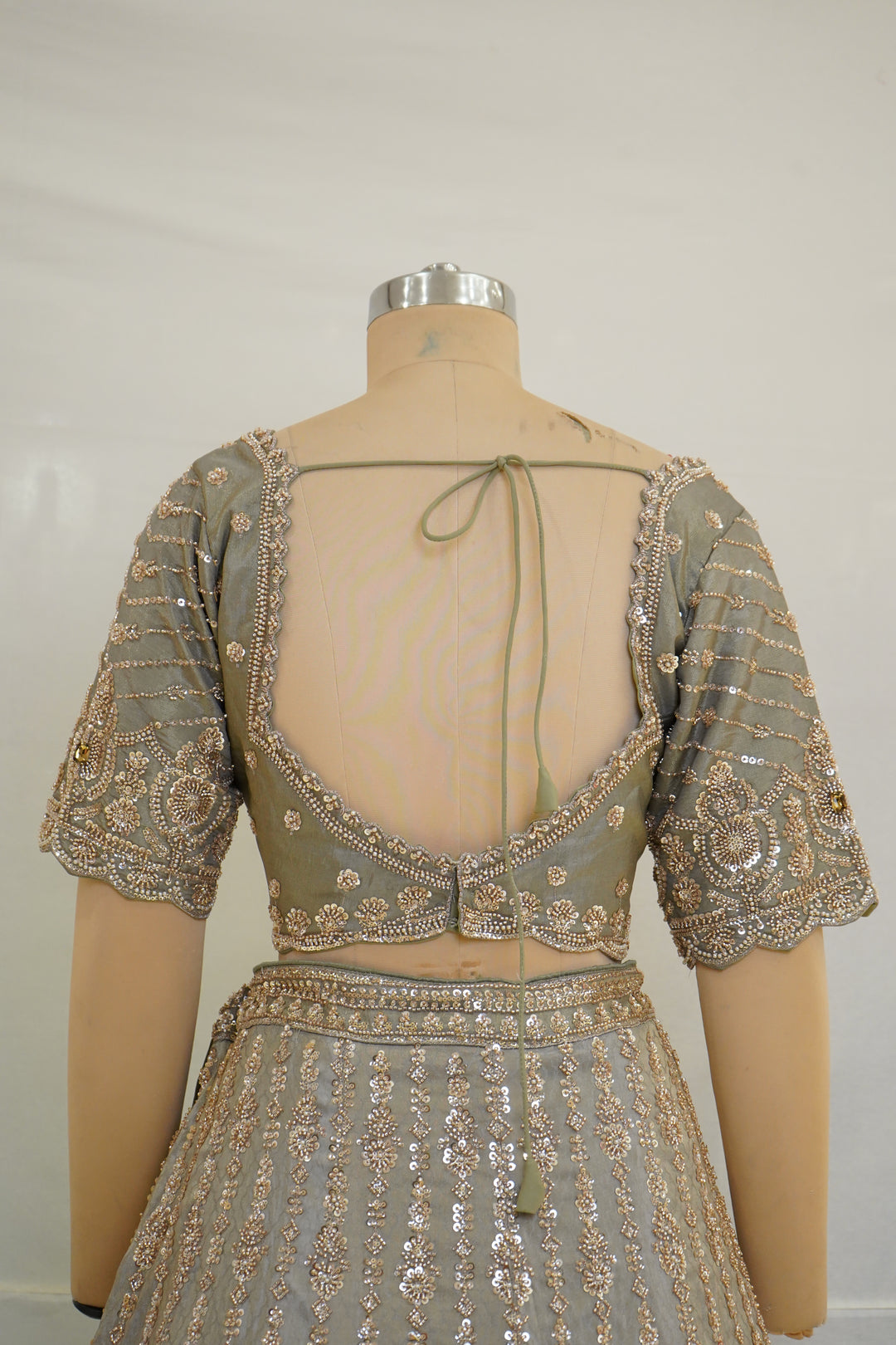 Champagne Beige Designer Lehenga Set with Sequin Embroidery & Embellished Net Dupatta