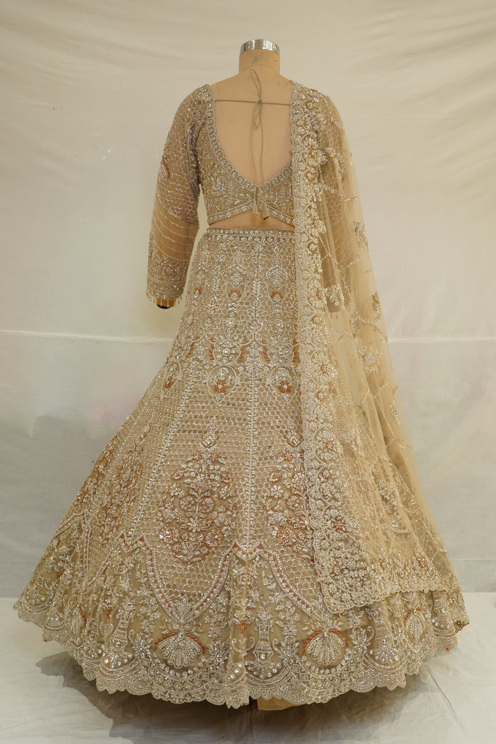 Champagne Gold Bridal Lehenga Set with Intricate Zardozi Embroidery & Luxury Net Dupatta