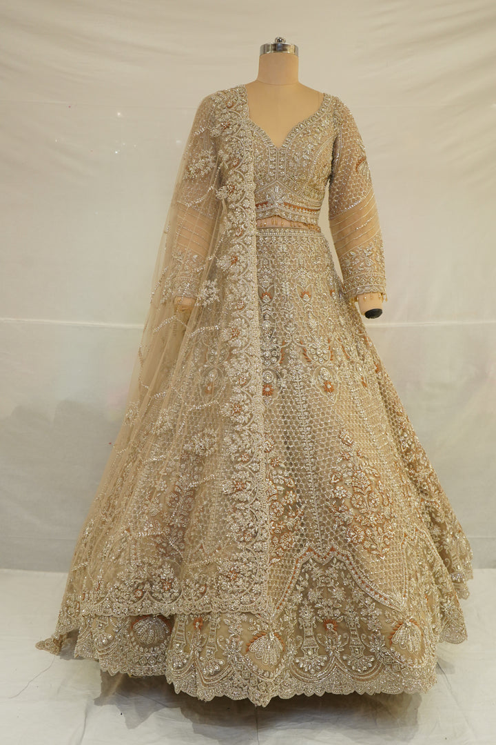 Champagne Gold Bridal Lehenga Set with Intricate Zardozi Embroidery & Luxury Net Dupatta