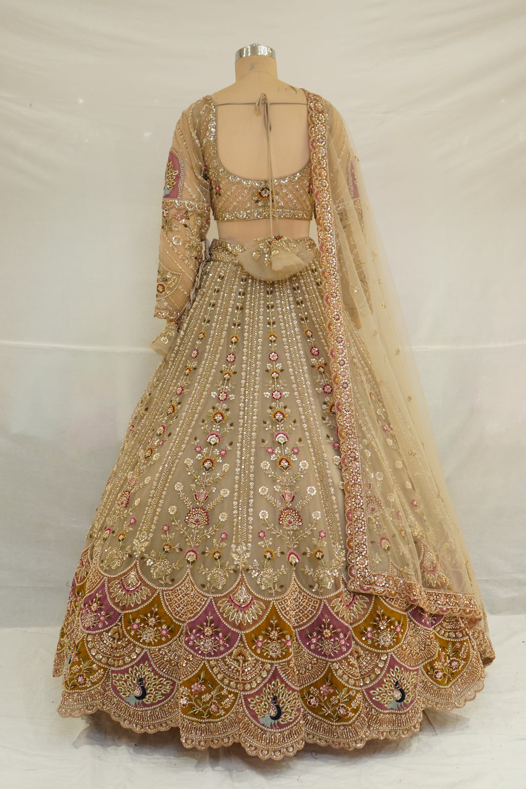 Beige Gold Designer Lehenga Set with Floral Embroidery & Embellished Net Dupatta