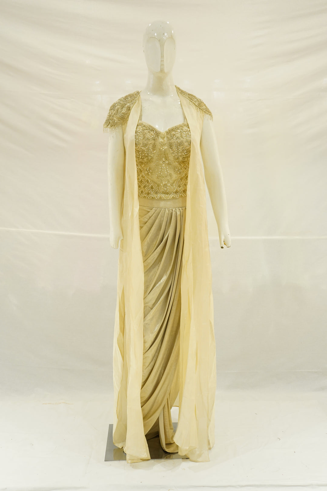 Champagne Gold Draped Saree Gown with Embellished Cape Jacket
